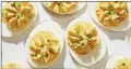  ?? TOM MCCORKLE — THE WASHINGTON POST ?? Simple Deviled Eggs.
Steam hard-cooked eggs on the stove top