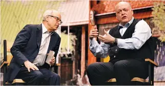  ??  ?? JIM HACKETT, CEO of Ford Motor Co., speaks during the Ford keynote with Michael Sandel (L), political philosophy professor at Harvard University at CES in Las Vegas, Nevada, Jan. 9.