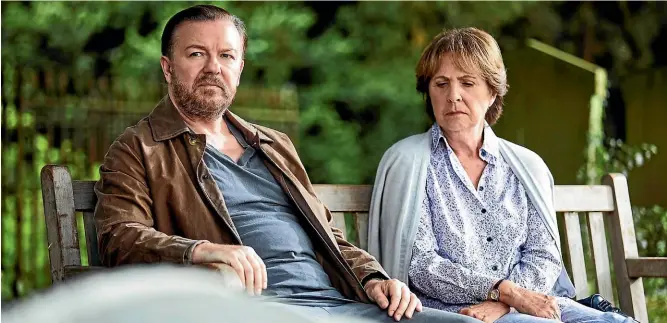  ??  ?? Tony (Ricky Gervais) meets Anne (Penelope Wilton) on the bench at the foot of his wife’s grave.