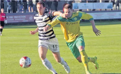  ?? Pic: Richard Birch ?? Caernarfon Town’s Jamie Breese (yellow) netted five goals on Monday night