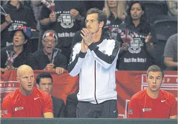  ?? AFP ?? Britain’s Andy Murray cheers on teammate Dan Evans in his match against Argentina’s Leonardo Mayer during the Davis Cup.