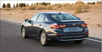  ??  ?? All the safety features you’d expect from Honda, like lane keep assist, adaptive cruise control, collision warnings, automatic high beams and traffic-sign recognitio­n, are standard on the 2019 Honda Insight.