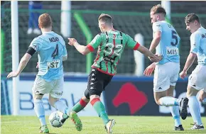  ??  ?? STRIKE Robbie McDaid gets on the scoresheet for Glentoran in the win over Warrenpoin­t