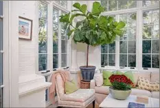  ?? Katherine Frey / The Washington Post ?? One of Joe and Jill Biden's favorite rooms in the vice president's residence was the apple green and white sunroom.