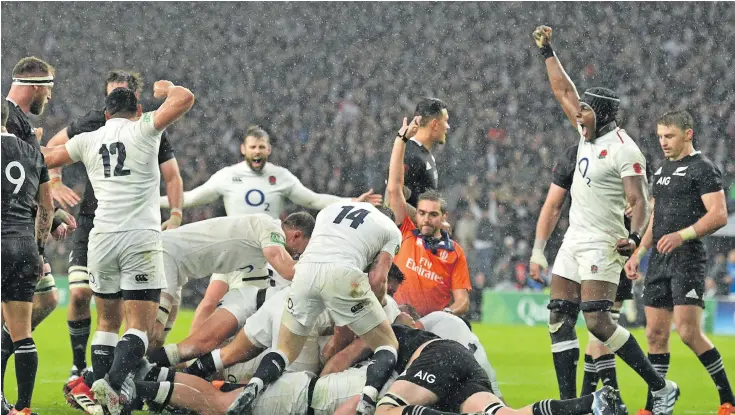  ?? Photo: Planet Rugby ?? England rugby players celebrate a try to captain Dylan Hartley from a rolling maul against the All Blacks at Twickenham in London on November 10, 2018. All Blacks fought back from a 15-0 deficit to win 16-15.