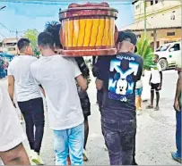  ?? CORTESÍA ?? Sepelio. En redes sociales circularon imágenes del traslado del féretro.