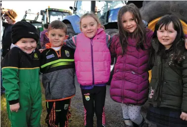  ?? Photos by Declan Malone ?? JJ Curran, Tom Evans, Maria Evans, Erin Curran and Alisha Curran at the start of Sunday’s fundraisin­g tractor run from Lios Póil in aid of Gairdín Mhuire and the Irish Lung Fibrosis Associatio­n.