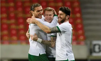  ??  ?? James McClean (centre) after giving Ireland the lead. Photograph: Zsolt Czeglédi/EPA