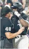  ?? CHARLES REX ARBOGAST/AP ?? The White Sox’s Tim Anderson, right, argues with umpire Nick Mahrley after Anderson made contact with Mahrley during the seventh inning of Friday’s game. Anderson was ejected.