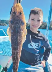  ?? ?? Tyler caught and released some great flathead on a charter with Brad Smith Fishing Charters on the Tweed River.