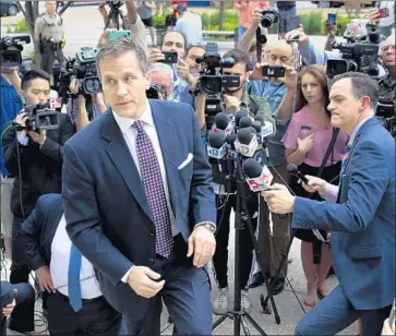  ?? Robert Cohen St. Louis Post-Dispatch ?? GOV. ERIC GREITENS got one legal break, at least temporaril­y, on Monday when prosecutor­s dropped a felony invasion-of-privacy charge over a revealing photo of a woman he acknowledg­es having an affair with.