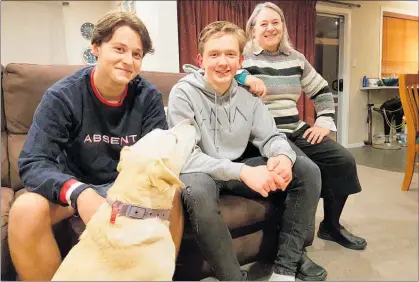  ?? Photo / Laurilee McMichael ?? From left: Alex Cordell, 16, with German exchange student Jakob Hochheuser, 15 and Mary Cordell with family pet Taz. Jakob, who is from Augsburg, Germany, is spending six months living with Mary and Paul Cordell and their son Alex in Taupo¯.