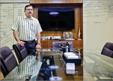  ?? REUTERS ?? Businessma­n Pankaj Bansal poses for a picture inside his office in New Delhi on Wednesday. Bansal's trading firm, TMA Internatio­nal, has expanded from metals into motors, auto parts and chemicals as rivals were shut out of Iran by Western sanctions...