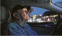  ?? Yi-Chin Lee / Houston Chronicle ?? Uber driver David Arnspiger, an 88-year-old Korean War veteran, takes a customer from the Loop to Tomball on Thursday.