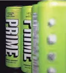  ?? BRANDON BELL/GETTY IMAGES) ?? Prime energy drinks are displayed for sale on shelves at a Walmart Supercente­r store July 10 in Austin, Texas.