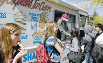  ?? TYLER ANDERSON / NATIONAL POST FILES ?? Ice-cream vendors have to wrestle with municipali­ties over location and noise restrictio­ns.