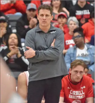  ?? KYLE FRANKO — TRENTONIAN PHOTO ?? Cornell coach Brian Earl looks on from the sideline during a game against Princeton at Jadwin Gymnasium. Earl was named the new coach at William & Mary on Saturday.