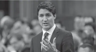  ?? ADRIAN WYLD/THE CANADIAN PRESS ?? Prime Minister Justin Trudeau’s government has declared that regardless of consultati­ons, it will end the voting system that has been in use in Canada since democracy was introduced here in 1791.