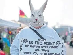  ?? Picture: PA ?? An Extinction Rebellion protester at a demonstrat­ion in London.