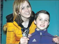  ??  ?? Jack Green with his mum Laura, who was under-9 champion in 1994.