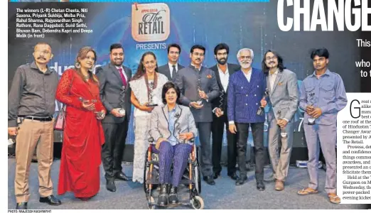  ?? PHOTO: RAAJESSH KASHYAP/HT ?? The winners (L-R) Chetan Cheeta, Niti Saxena, Priyank Sukhija, Melba Pria, Rahul Sharma, Rajyavardh­an Singh Rathore, Rana Daggubati, Sunil Sethi, Bhuvan Bam, Debendra Kapri and Deepa Malik (in front)