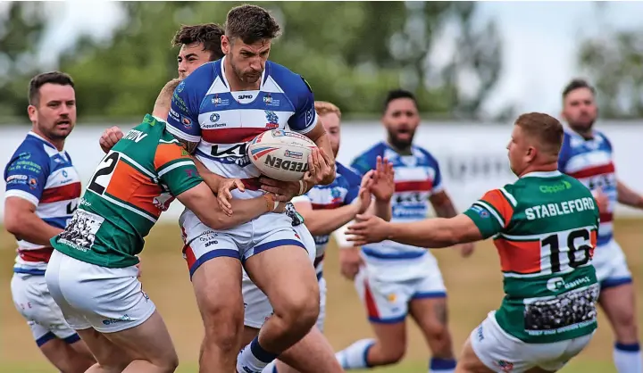  ?? Simon Hall ?? ● Action from Hornets League 1 clash against Hunslet at the South Leeds Stadium on Sunday. See page 27