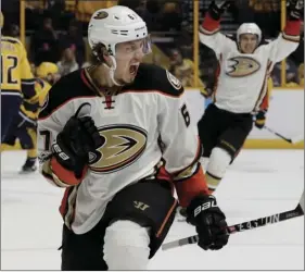  ??  ?? This May 18 file photo shows Anaheim Ducks center Rickard Rakell, of Sweden, celebratin­g his goal in the first period of Game 4 of the Western Conference final against the Nashville Predators in the NHL hockey Stanley Cup playoffs in Nashville, Tenn....
