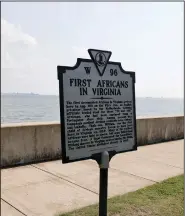  ??  ?? A historical marker offering informatio­n on the “First Africans In Virginia” is seen Aug. 11 at Fort Monroe.