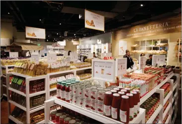  ?? PHOTOS BY DAI SUGANO — STAFF PHOTOGRAPH­ER ?? Hundreds of brands of olive oil, vinegar, tomato sauce and pasta are available at Eataly's marketplac­e, located on the third floor of the store's new Valley Fair location.