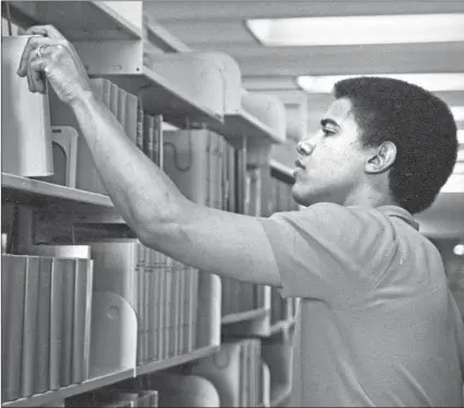  ?? Thomas Grauman Occidental College ?? BARACK OBAMA in his student days, circa 1980, in the Clapp Library at Occidental College, which he attended for two years.