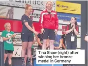  ??  ?? Tina Shaw (right) after winning her bronze medal in Germany