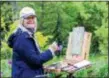  ??  ?? Artist Elise Phillips paints at Chanticlee­r during the 2017 Plein Air Festival.