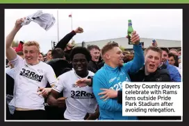  ??  ?? Derby County players celebrate with Rams fans outside Pride Park Stadium after avoiding relegation.