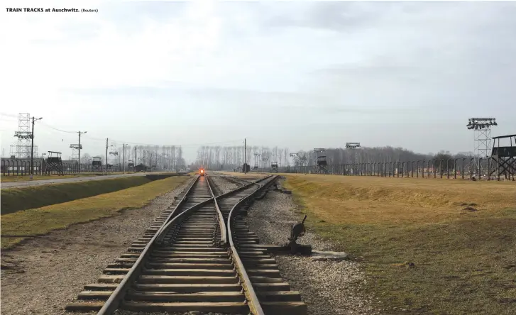  ?? (Reuters) ?? TRAIN TRACKS at Auschwitz.