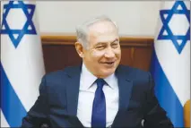  ?? AMIR COHEN / AP FILE ?? Israeli Prime Minister Benjamin Netanyahu could face a criminal indictment for bribery.