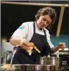  ?? PAUL TRANTOW — PROVIDED BY BRAVO ?? Carrie Baird of Denver cooks on “Top Chef” Season 15.