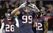  ?? Eric Christian Smith Associated Press ?? ALL-PRO J.J. Watt, drafted by Houston in 2011, reached a two-year, $31-million deal with Arizona.