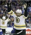  ?? CHRIS O’MEARA — THE ASSOCIATED PRESS ?? Boston Bruins left wing Rick Nash (61) celebrates his goal against the Tampa Bay Lightning during the first period of Game 1 of an NHL second-round hockey playoff series Saturday in Tampa, Fla.