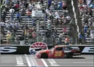  ?? LARRY PAPKE — THE ASSOCIATED PRESS ?? Erik Jones crosses the finish line for the win in the Xfinity Series auto race at Texas Motor Speedway in Fort Worth, Texas on Saturday.