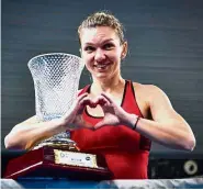  ??  ?? On fire: Simona Halep of Romania celebratin­g her win against Katerina Siniakova of the Czech Republic in the Shenzhen Open final yesterday. — AFP