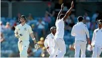  ?? GETTY IMAGES ?? South Africa bowler Kagiso Rabada was initially banned for a match for an altercatio­n with Australia captain Steve Smith, left, though it was later overturned on appeal.