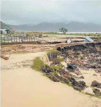  ?? Photo / Uawa Civil Defence ?? A road is washed out at Anaura Bay after the East Cape is hit by torrential rain.
