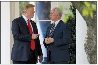  ?? AP/EVAN VUCCI ?? President Donald Trump confers with Vice President Mike Pence outside the Oval Office on Tuesday before Trump boarded Marine One on his way to a campaign event in Nashville, Tenn.