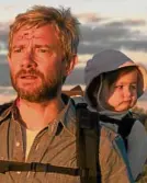  ??  ?? Spouses played by Martin Freeman and Susie Porter (left photo) struggle during the zombie plague.