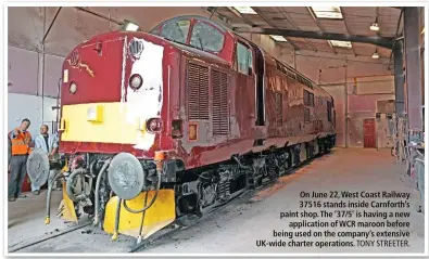  ?? TONY STREETER ?? On June 22, West Coast Railway 37516 stands inside Carnforth's paint shop. That '37/5' is having a new applicatio­n of WCR maroon before being used on the company's extensive UK-wide charter operations.