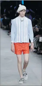  ?? — THE ASSOCIATED PRESS FILES ?? Sky-blue continues to be trendy, as seen in Gucci men’s springsumm­er 2016 collection.