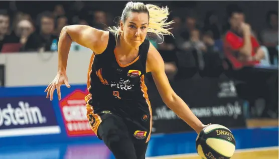  ?? Picture: ALIX SWEENEY ?? DETERMINED: Townsville Fire's Tess Madgen is gunning for a big season in the WNBL.