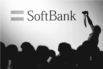  ??  ?? The logo of SoftBank is displayed at SoftBank World 2017 conference in Tokyo, Japan. Japan’s tax authoritie­s penalised SoftBank’s mobile carrier unit and ordered it to pay back taxes after it found the company hid about 140 million yen (US$1.25...
