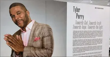  ?? RODNEY HO/RHO@AJC.COM ?? The Tyler Perry exhibit sums up his life: a tough childhood; struggles to break into entertainm­ent; success of his plays, Madea films and TV comedies; and his road to being a respected filmmaker, studio owner and philanthro­pist.