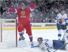  ?? BRUCE BENNETT/GETTY IMAGES ?? Russia’s Vadim Shipachyov a second period goal by Ivan Telegin Thursday during Russia’s 3-0 win over Finland in the World Cup of Hockey.